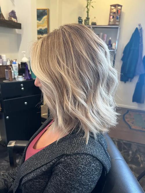 Money Piece Hair Color in the Denver Metro Area This soft blonde money piece adds brightness around (..)